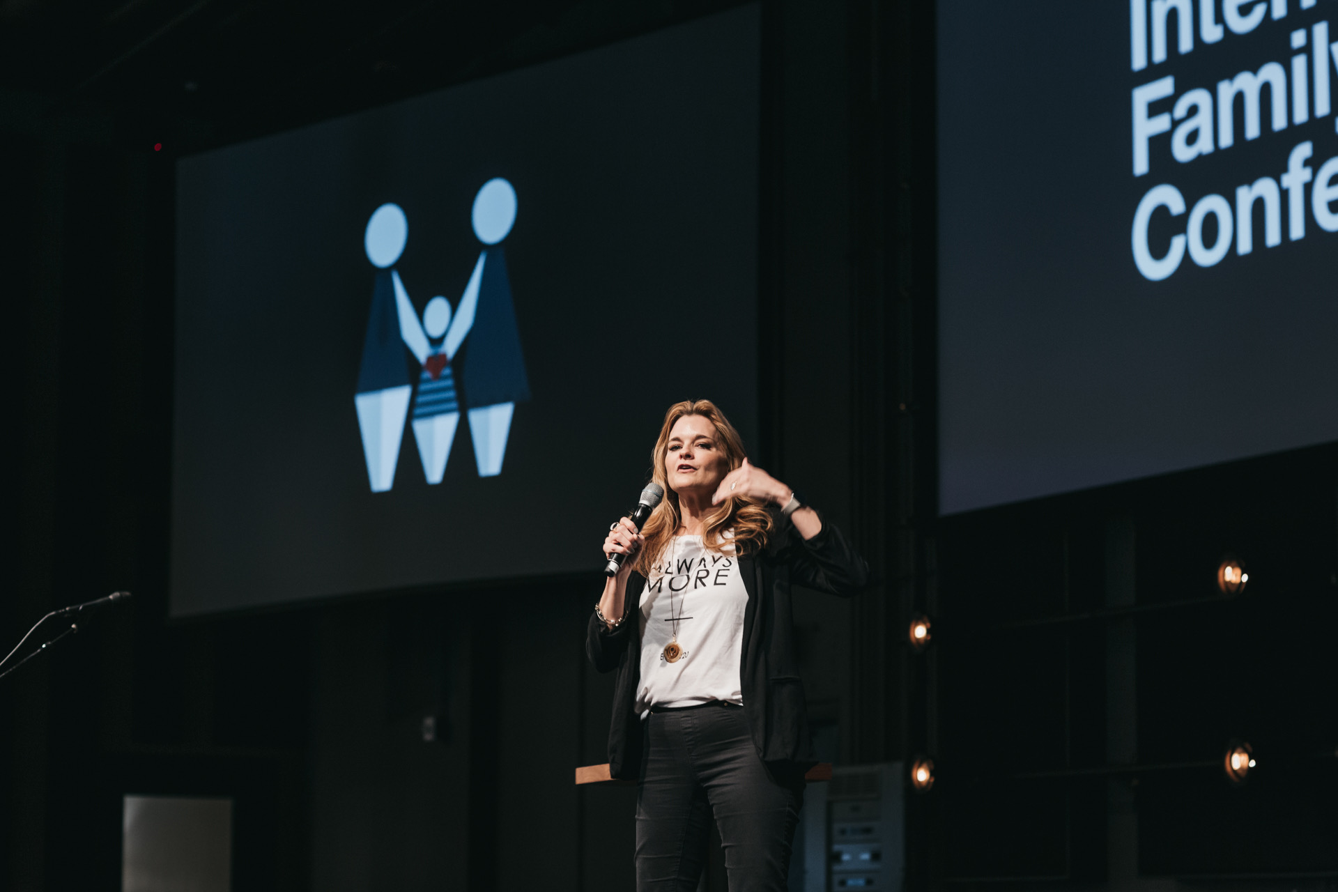 Jules speaking on stage